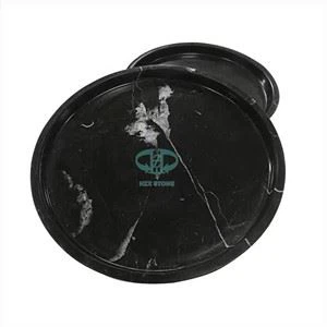 Plateau rond en marbre noir